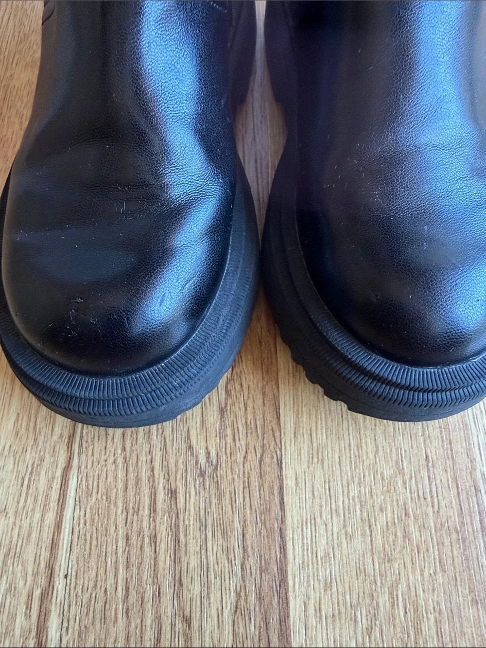 Zara Girls Treaded Knee-High Boots in black.